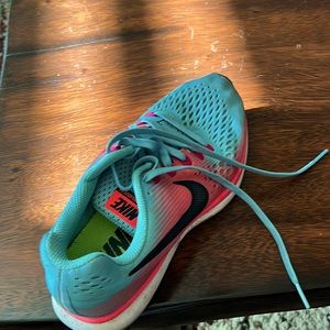 Nike Running shoes, they don’t sell any like this anymore !! Barley worn.